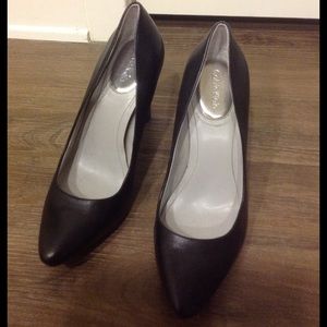 black Calvin Klein pumps