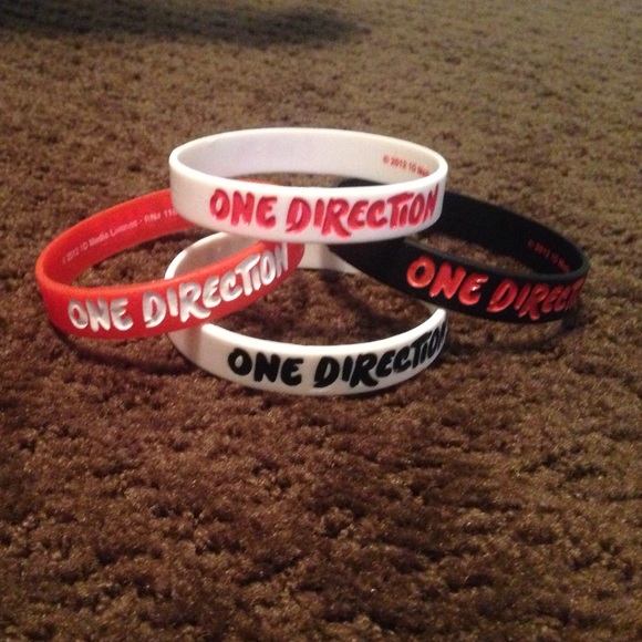 4 out of 5 rubber One Direction bracelets