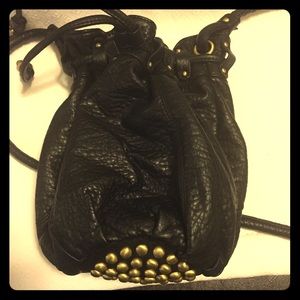 Deena & Ozzy black and gold studded bucket bag