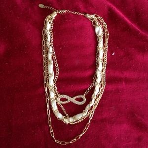 Gold layered infinity symbol necklace