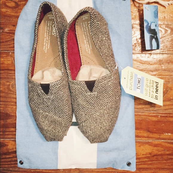 TOMS brown metallic herringbone slip ons