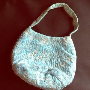 The Limited Tiffany blue small beaded purse.