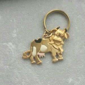 Key chain. Gold cow with some coloring.