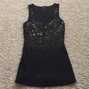 A black tank top with black sparkles.