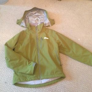 Olive green Sherpa rain jacket.