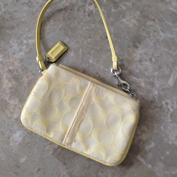 Coach Handbags - Pale Yellow Coach Wristlet