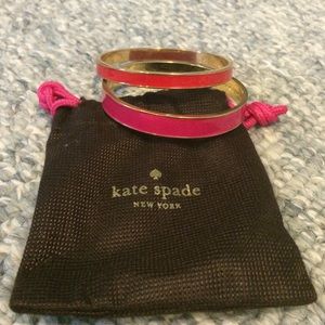 Red and pink Kate spade bracelets