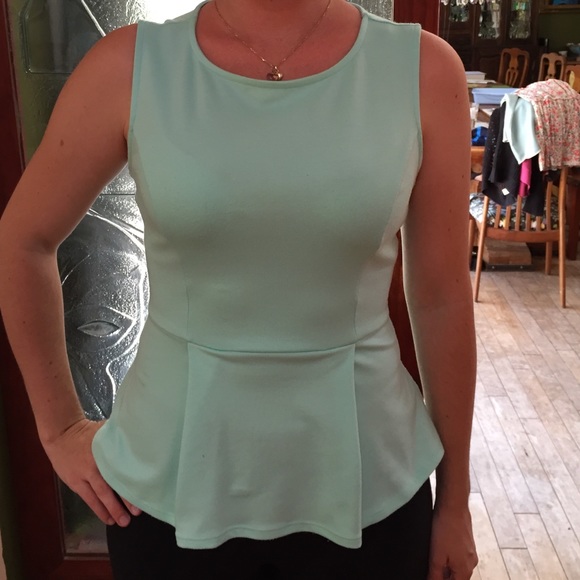 Green peplum tank top