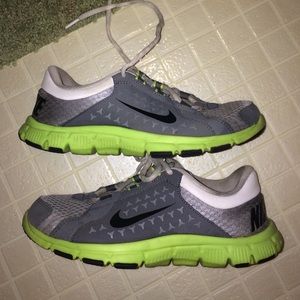Nike grey/neon shoes.