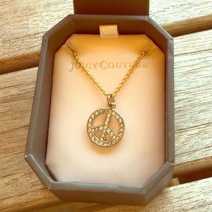 Juicy Couture peace sign necklace, NWT. Gold w/box