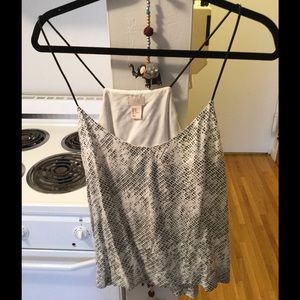 Black and white tank top with leather straps