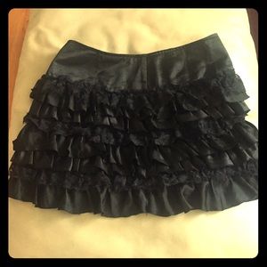 Black ruffle mini skirt