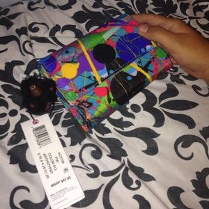 colorful Kipling wallet ! 💖💚💙❤️💛⚫️🔶