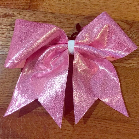 Pink sparkly cheerleading bow