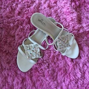 white bedazzled shoes