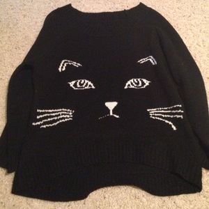 Reversible cat sweater perfect for Halloween
