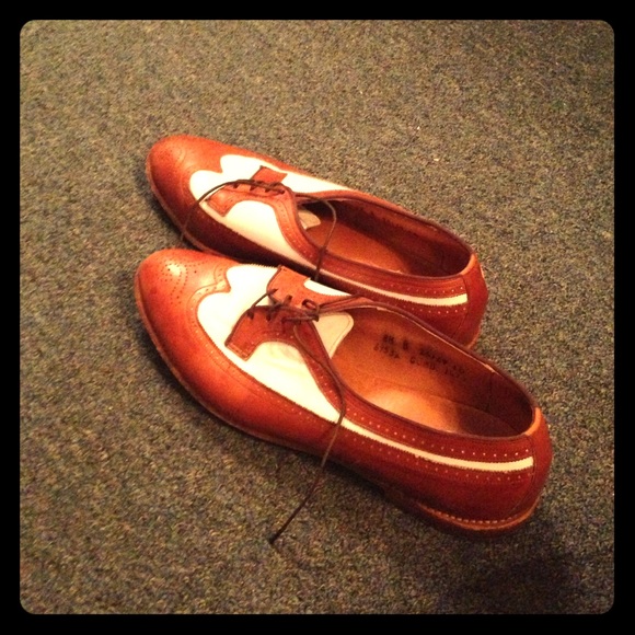 Vintage tan and white wingtips.