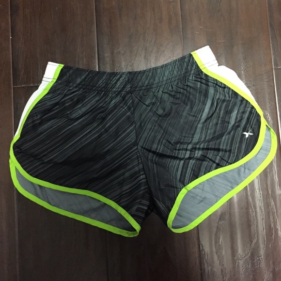 Grey black and green XS xeraion running shorts.