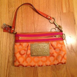 Orange and pink coach poppy wristlet