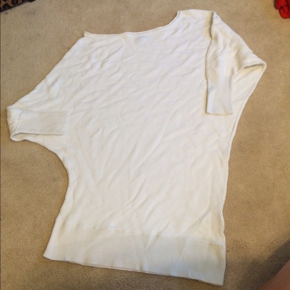 Asymmetrical neckline knit shirt