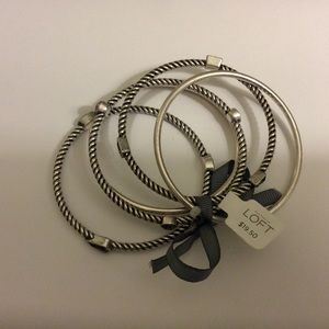 Set of 5 silver bangles. Never worn!