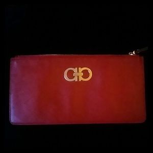 Blood red Ferragamo wristlet