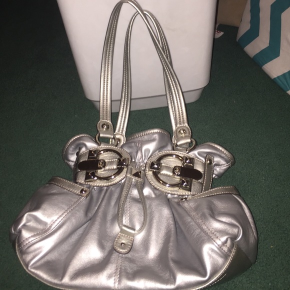 Silver metallic pocketbook in perfect condition