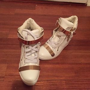 All white tennis shoe boots w/ gold metal hardware