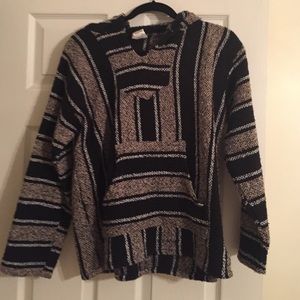 Black white and tan drug rug