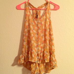 Flowing yellow floral hi-low tank top
