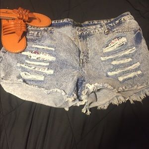 Distressed denim cutoff shorts