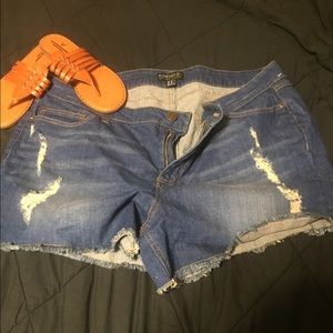 Distressed dark denim cutoff shorts