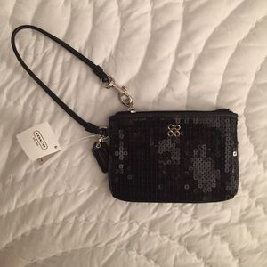 Coach small, black, sequin wristlet