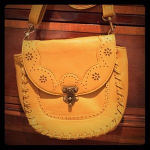 Mustard colored boho leather purse