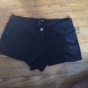 Black faux leather shorts