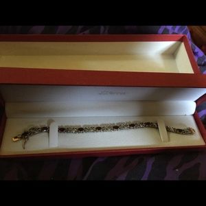 14 kt gold over SS. Genuine Garnet and Diamond