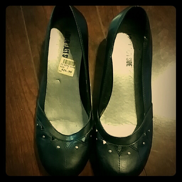 Black ballet flats with a small wedge