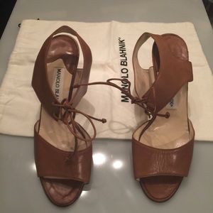 Manolo Blahnik sandals.