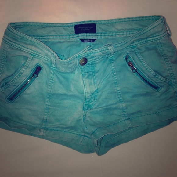 American Eagle blueish green shorts.