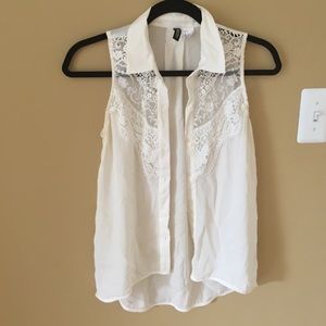 White sleeveless button up with lace detail
