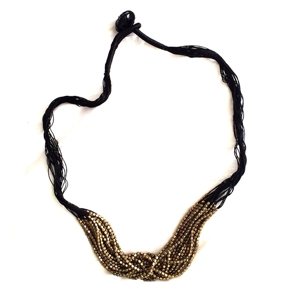 Gold and black necklace