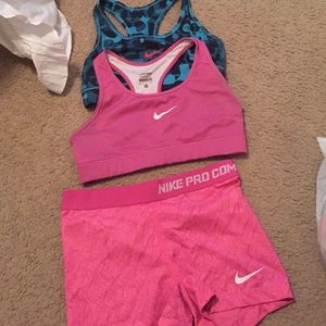 2 nike sports bras and small Nike spankies!