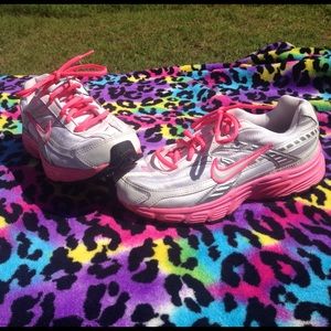 White/silver/hot pink nike shoes