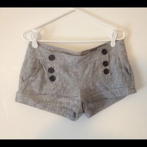 Black and white shorts.