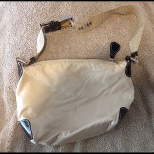 Small tan and black purse