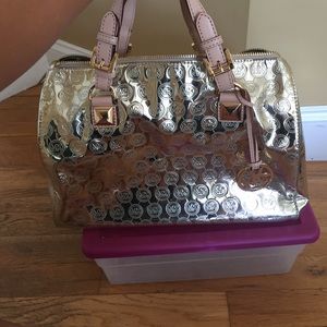 Gold Michael kors purse speedy style