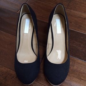 Black closed toe wedge.