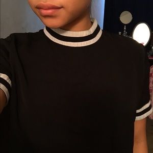 Black shirt with a high neck collar