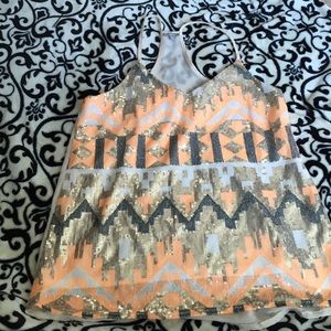 Sequined razor back top.