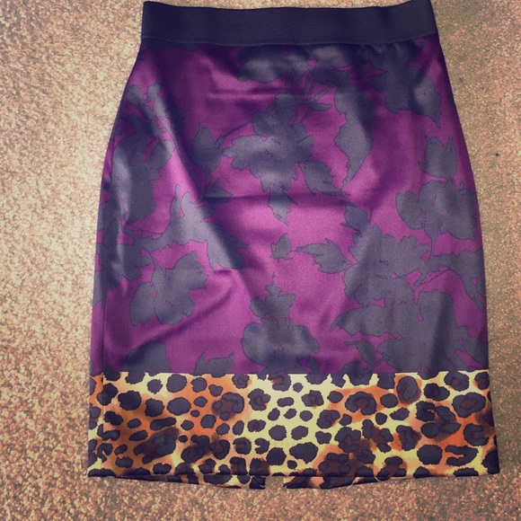 Express purple and black with cheetah print skirt.